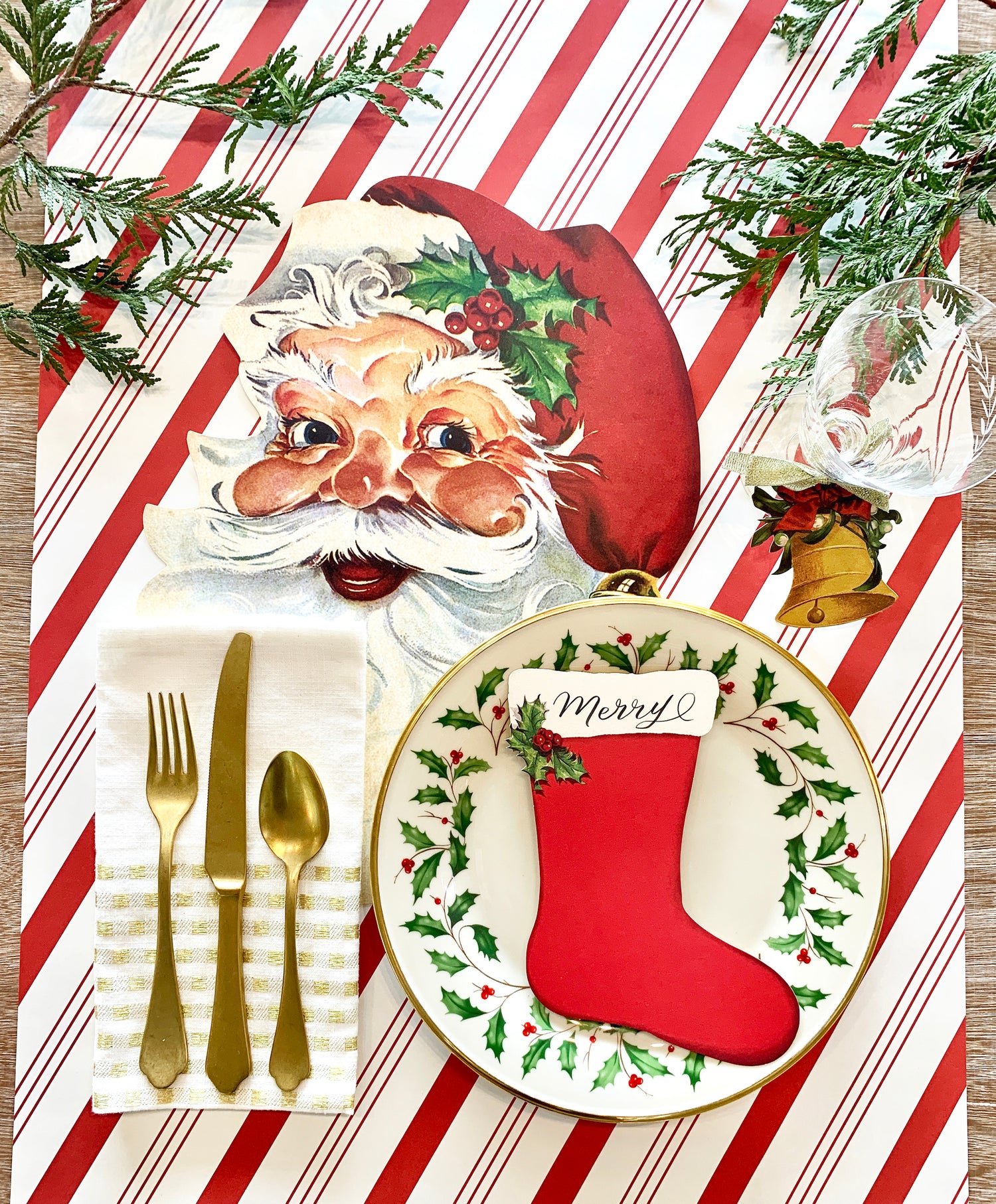 A die-cut, vintage-style illustration of Santa Clause&