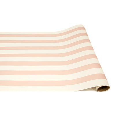 A paper roll with thick pink and white stripes running down the length.