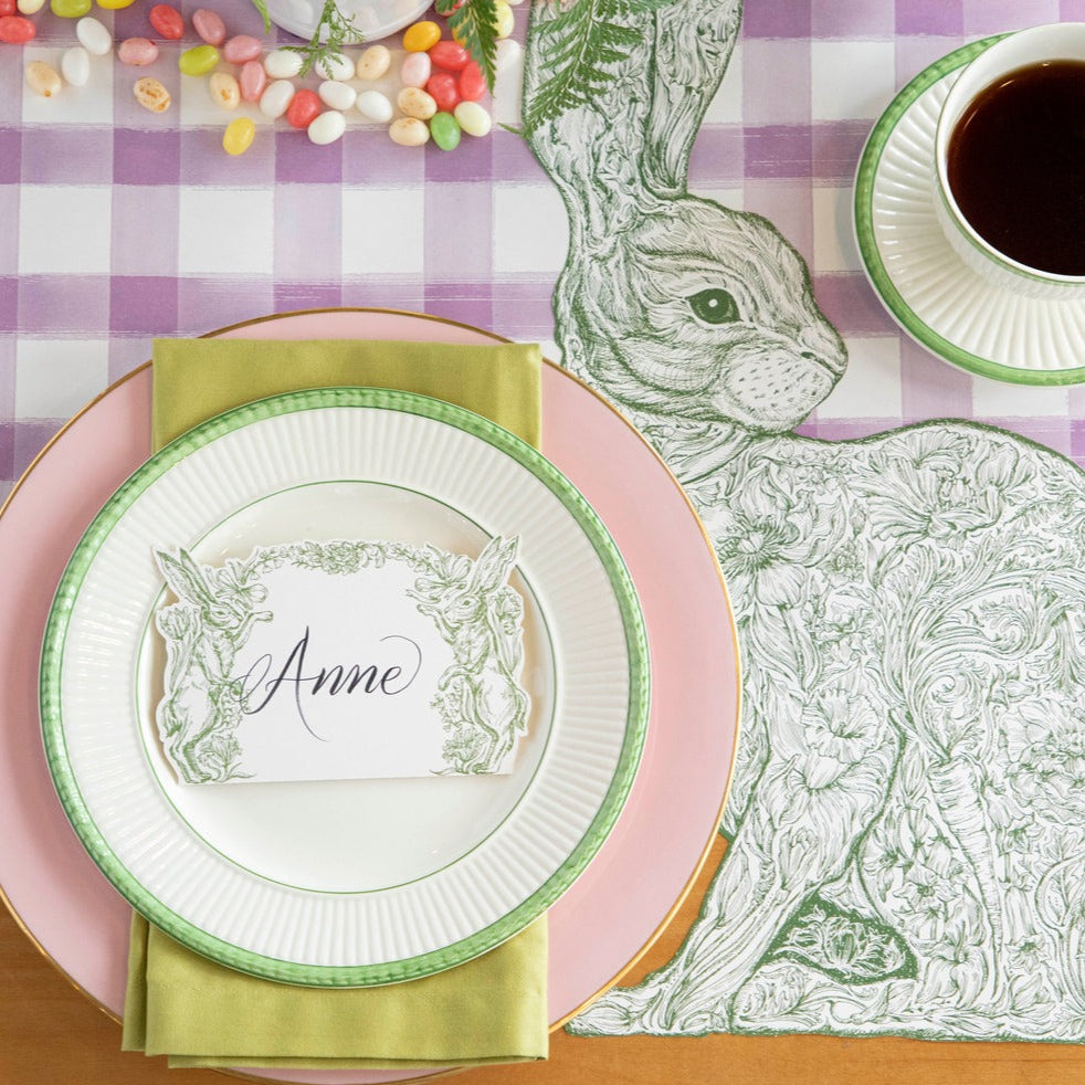 The Die-cut Greenhouse Hare Placemat under an elegant Easter place setting, from above.