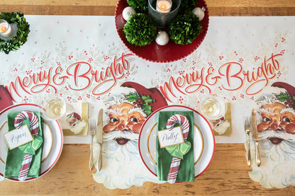 The Die-cut Santa Placemat under a festive Christmas table setting, from above.