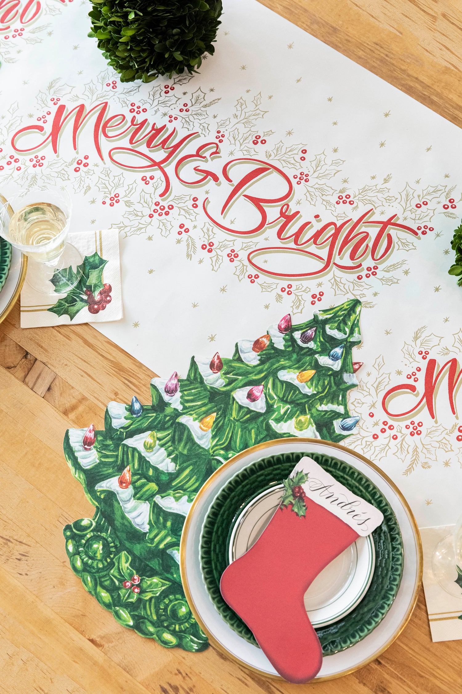 The Merry &amp; Bright Runner under a festive Christmas-themed table setting.