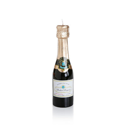 A Zodax Mini Champagne Bottle Candle on a white background.