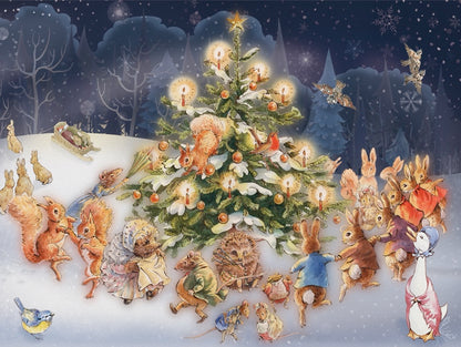 Close up of puzzle image; a Christmas tree with woodland creatures dancing around it.