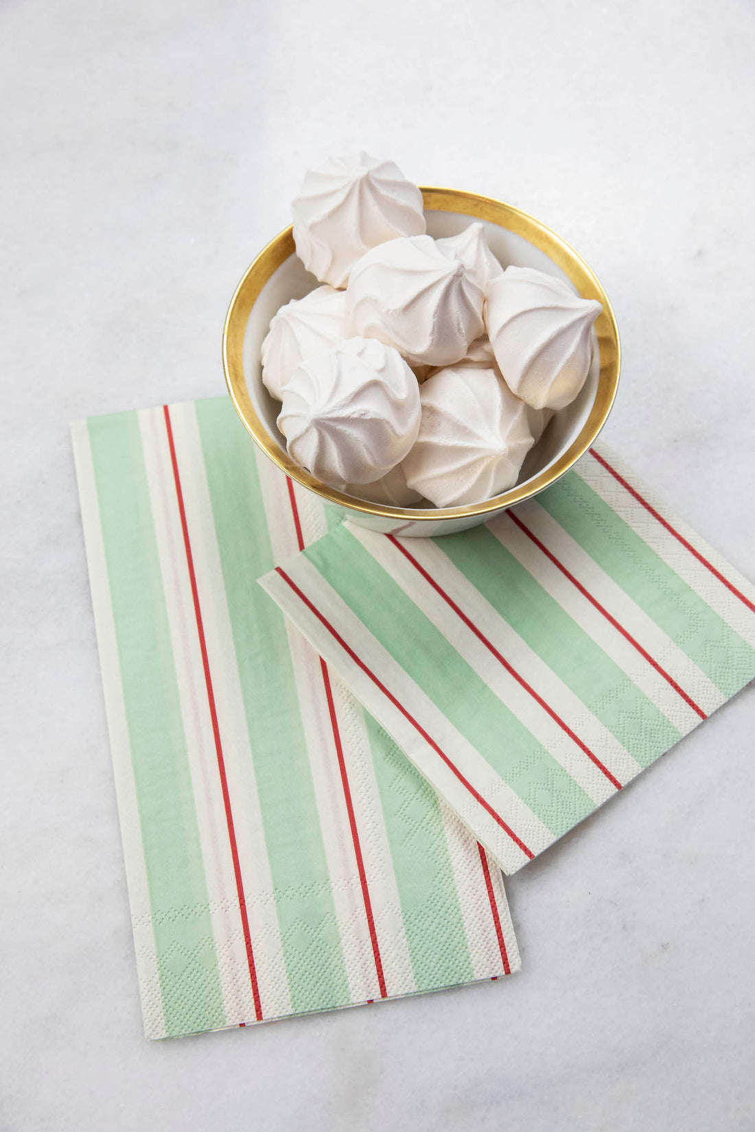 Two Seafoam &amp; Red Awning Stripe Napkins, one Guest and one Cocktail, under a bowl of treats.