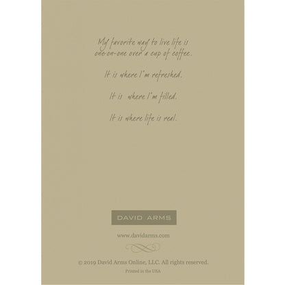 The beige back side of the greeting card, featuring a quote from artist David Arms.