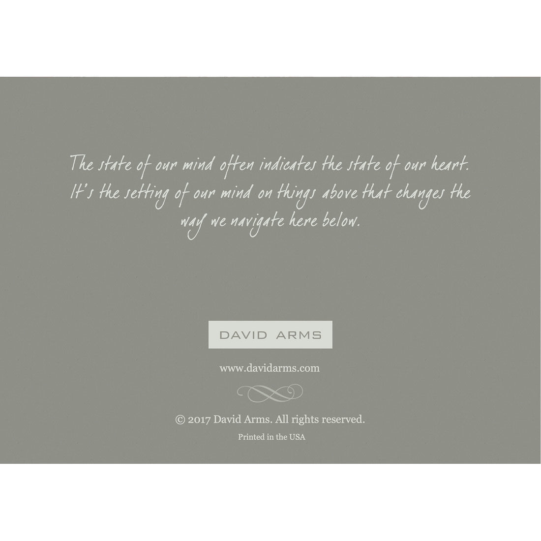 The gray back side of the greeting card, featuring a quote from artist David Arms.