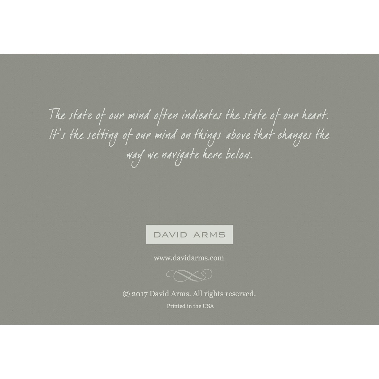 The gray back side of the greeting card, featuring a quote from artist David Arms.