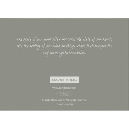 The gray back side of the greeting card, featuring a quote from artist David Arms.