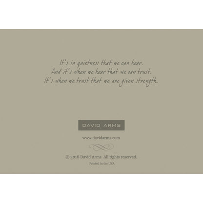 The gray back side of the greeting card, featuring a quote from artist David Arms.