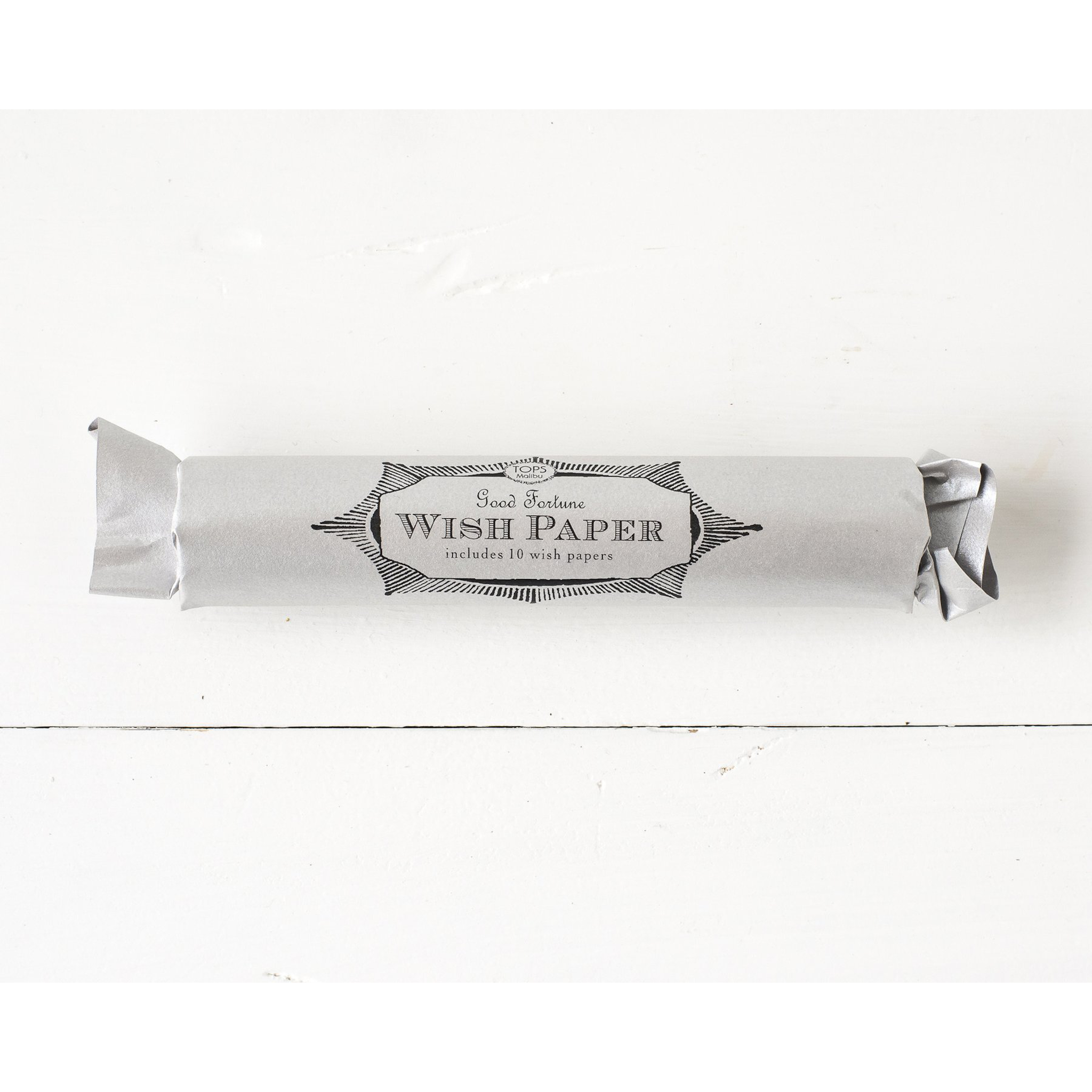 Two rolls of magenta Tops Malibu Wish Papers on a white background.