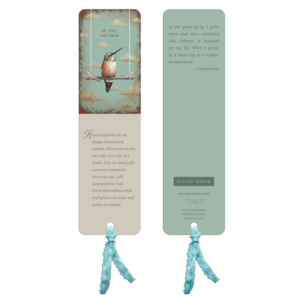 A David Arms bookmark with a hummingbird and a red ribbon.