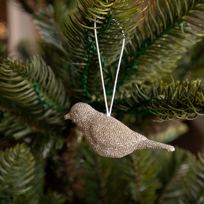 Diamond bird hanging on tree