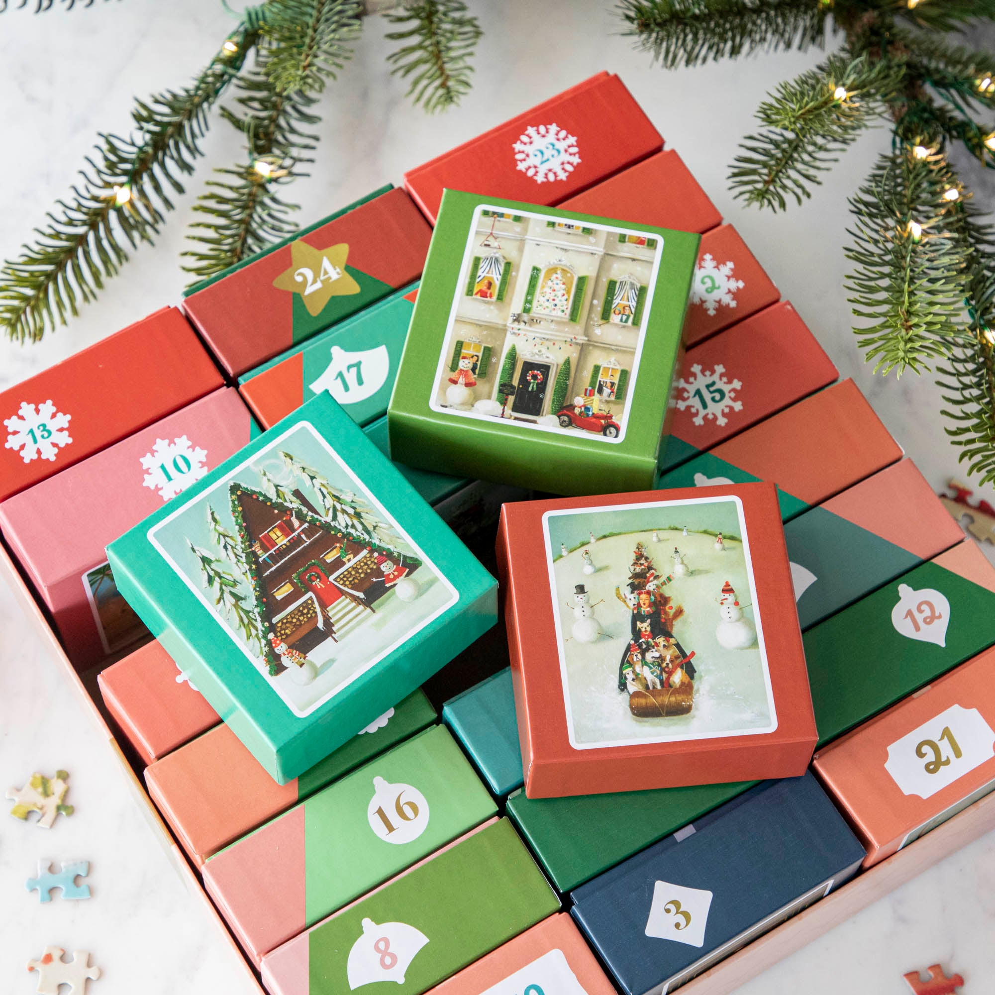 Overhead shot of Janet Hill Advent calendar with a few boxes on top.