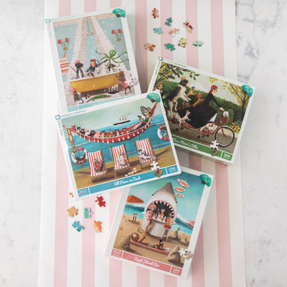 Beachgoers enjoying refreshments at a whimsical Sand Shark Bar depicted in a New York Puzzle Company jigsaw puzzle.