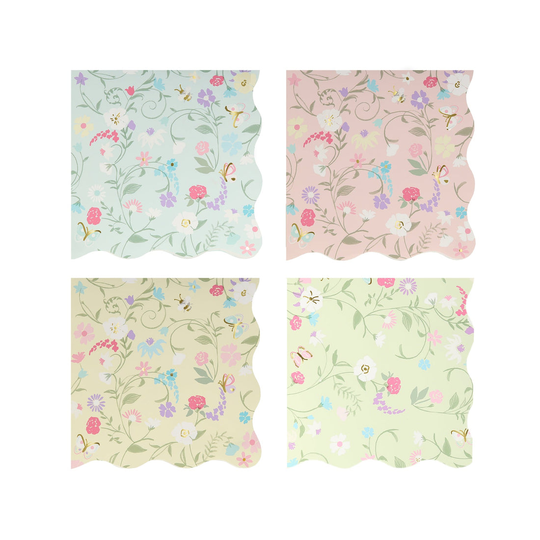 A set of four Meri Meri Ladurée Floral Small Napkins with scalloped borders and flowers on them.