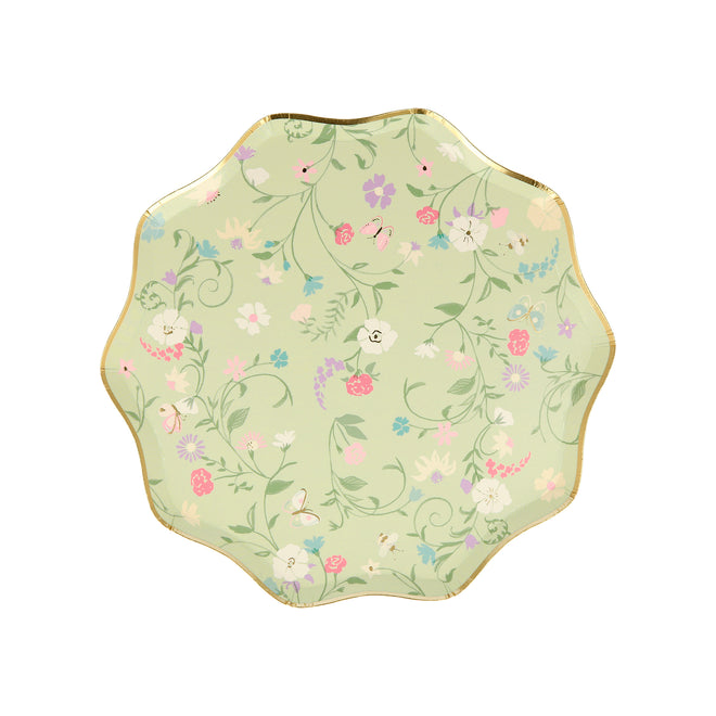 A Ladurée Paris Floral Side Plate with a Meri Meri floral design on it.