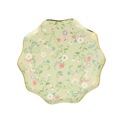 A Ladurée Paris Floral Side Plate with a Meri Meri floral design on it.