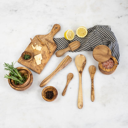 A set of nonporous Natural Olivewood Olivewood Spoons with lemons and salt.